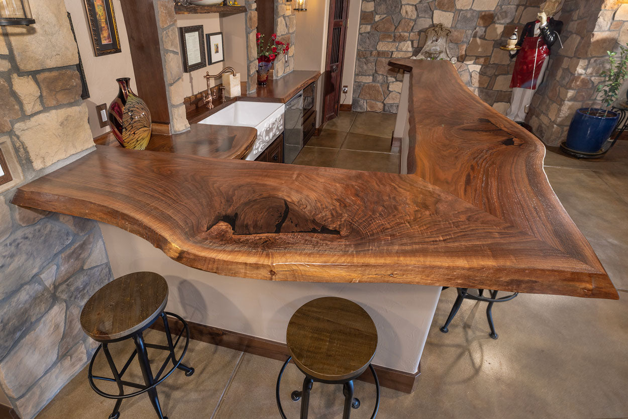 Luxury live edge black walnut bar top table for Italian inspired wine room.