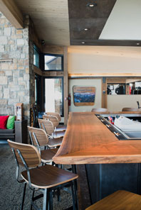 Custom fabricated Black Walnut live edge bar top for restaurant at Gwyn's High Alpine.