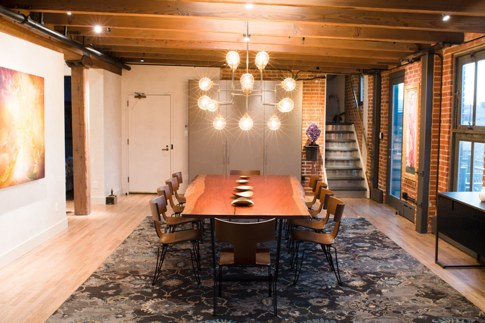 Bubinga single slab dining table in modern Denver Loft.