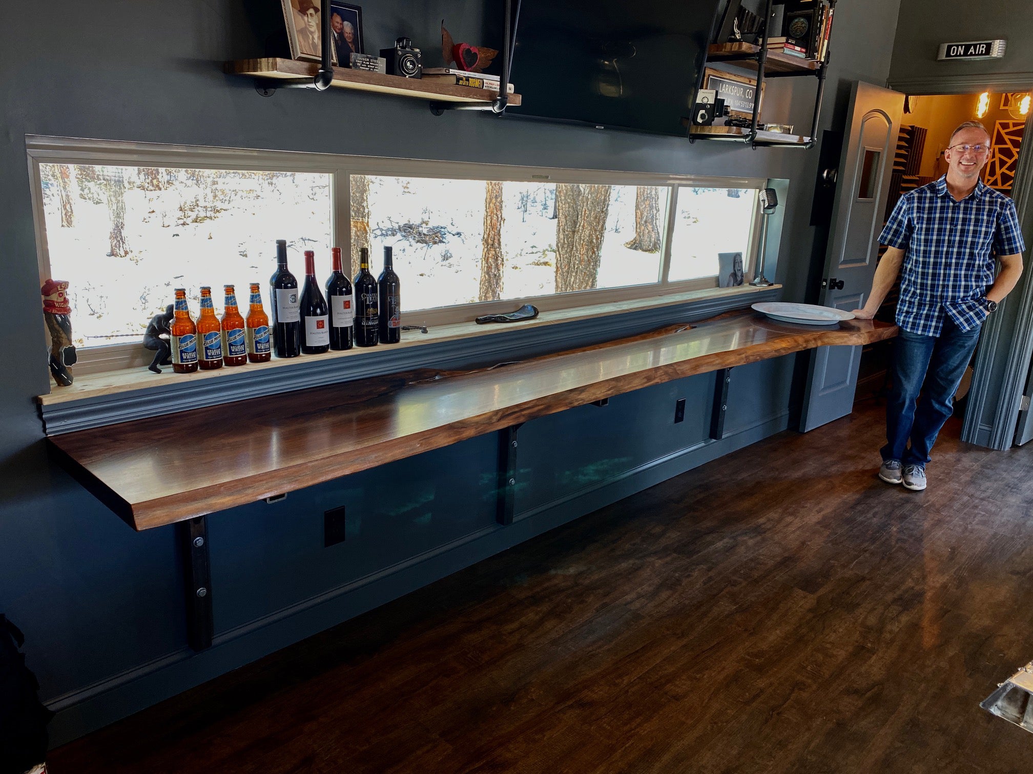 Bar top and wine serving table made from a black walnut slab.