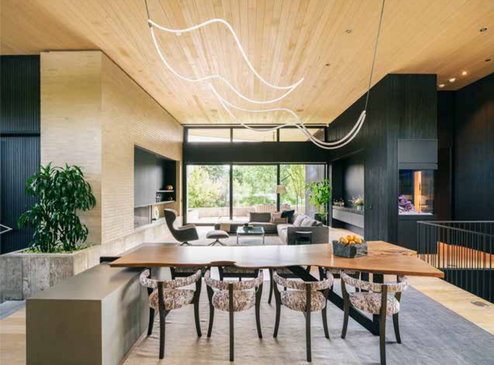 Modern in Denver feature magazine article photo with CS Woods and Batch and Trowel Elm solid wood slab plinth dining table.