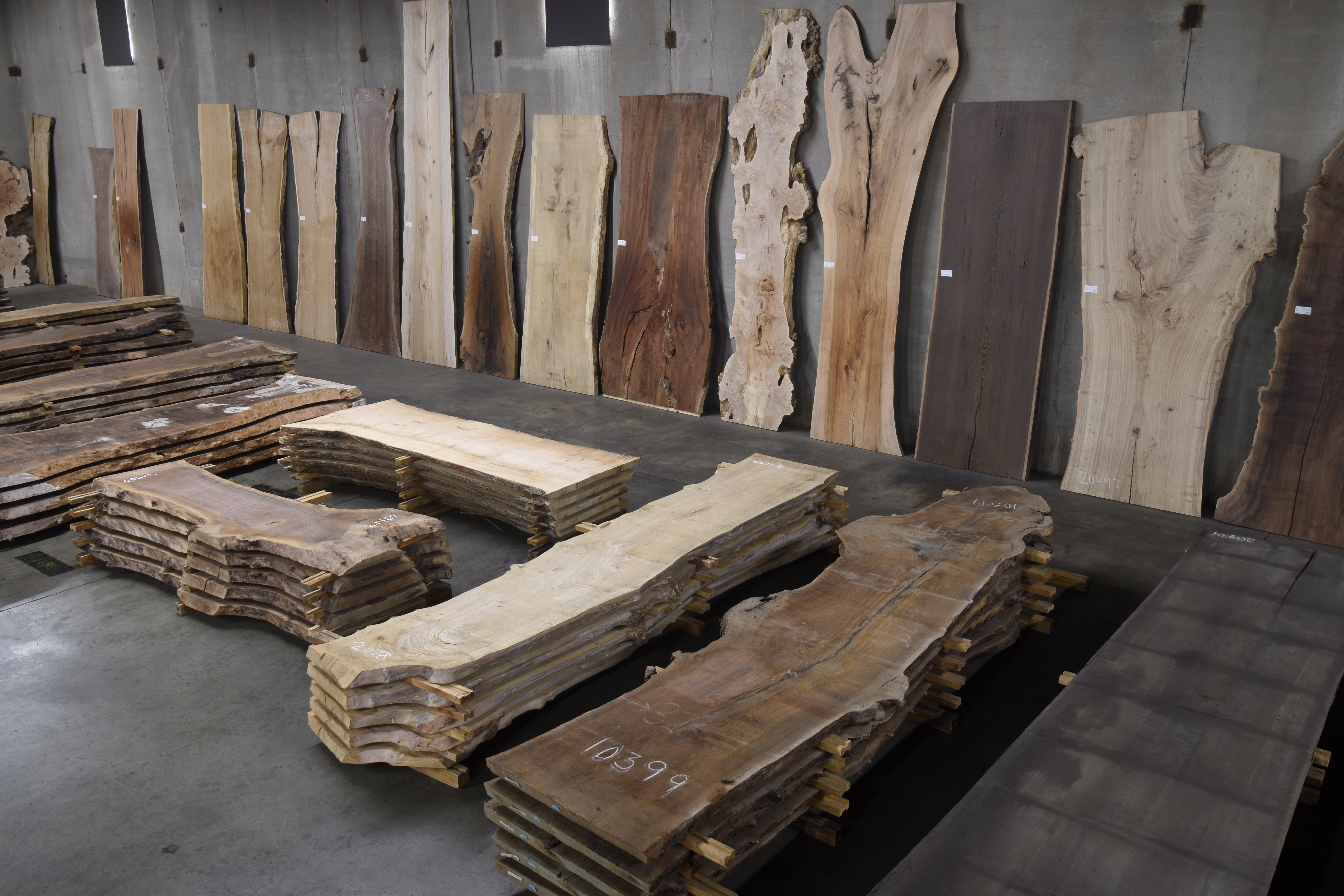 Choosing wood slabs at CS Woods warehouse Denver