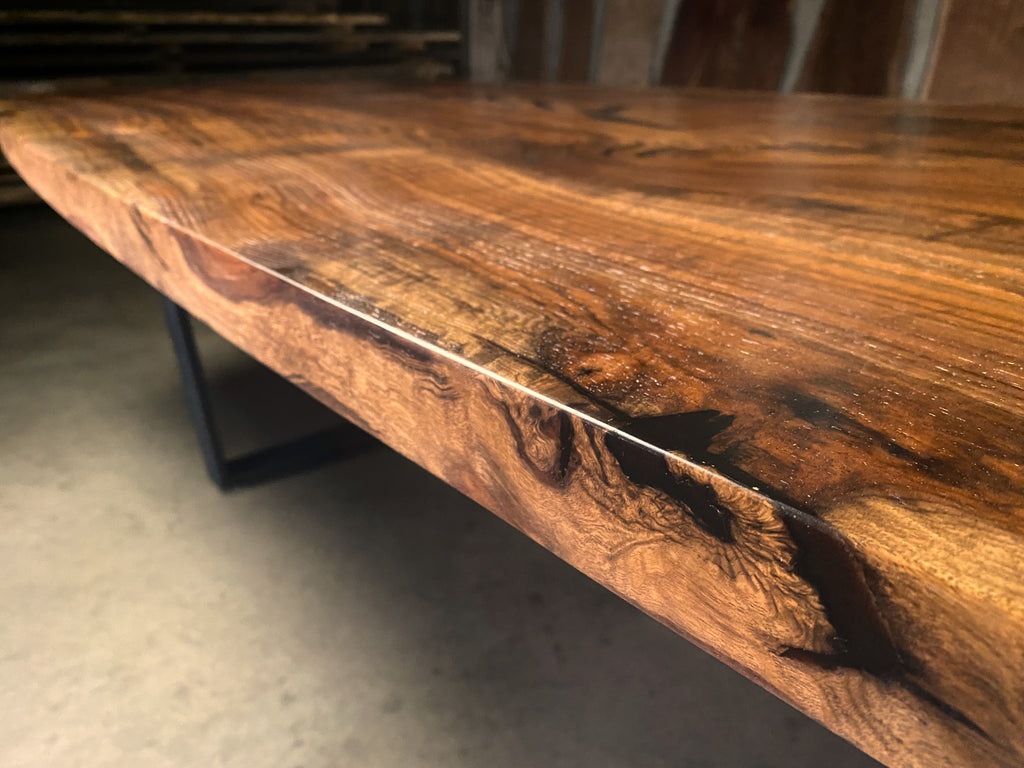 Claro Walnut Single Slab Elliptical Table