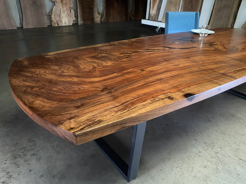 Claro Walnut Single Slab Elliptical Table