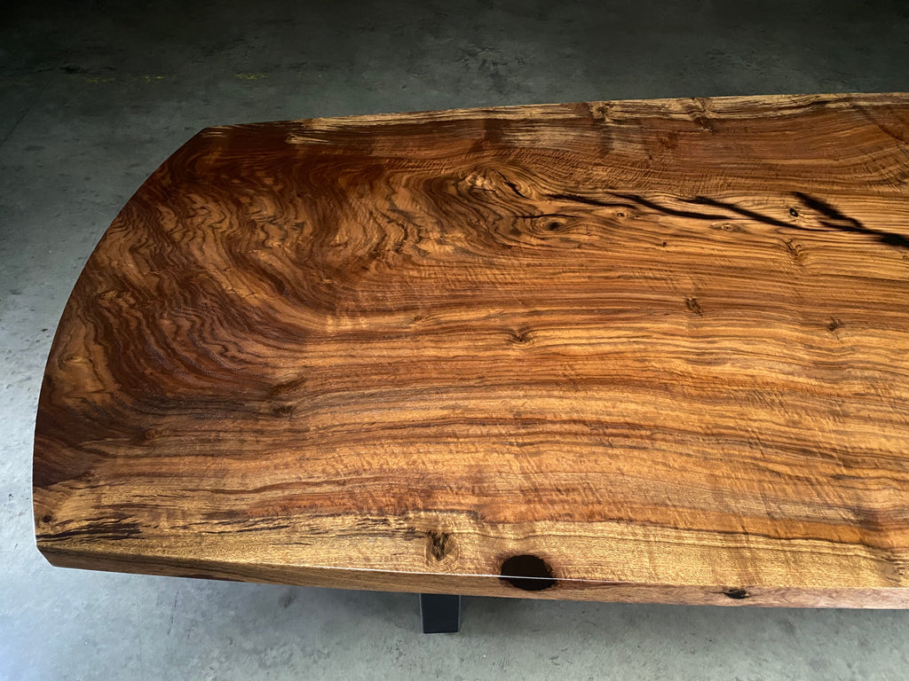 Claro Walnut Single Slab Elliptical Table