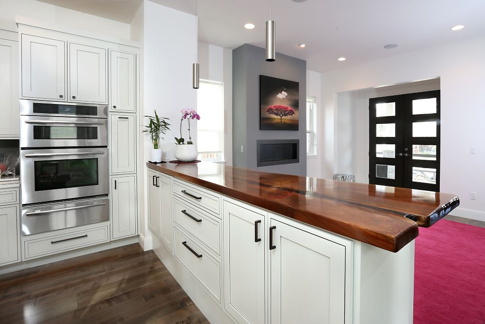 Walnut slab live edge kitchen counter.