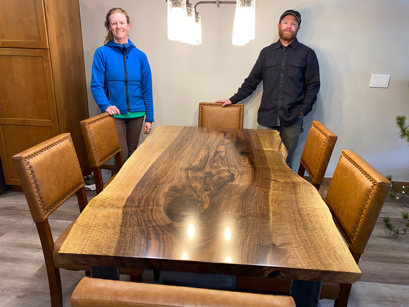 Walnut live edge dining table crafted by CS Woods with the happy customers. 